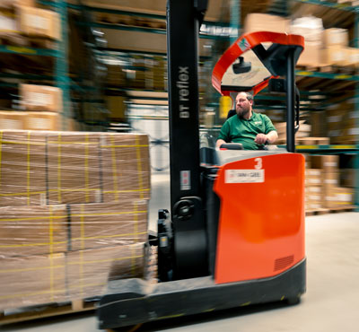 WKK employee on forklift taking care of a fast delivery