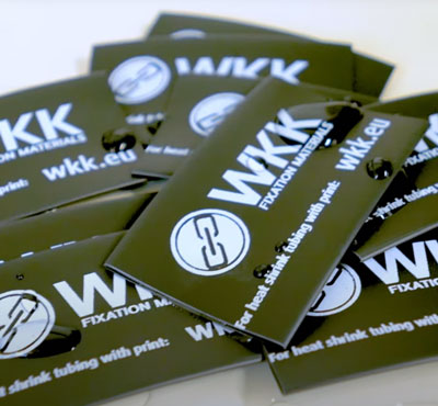 Heat shrink tubing pieces with WKK print on it