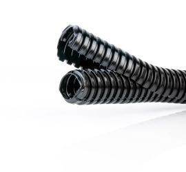 Black corrugated tubing, standard issue, with a piece of corrugated tubing with cables guided through it in the background.